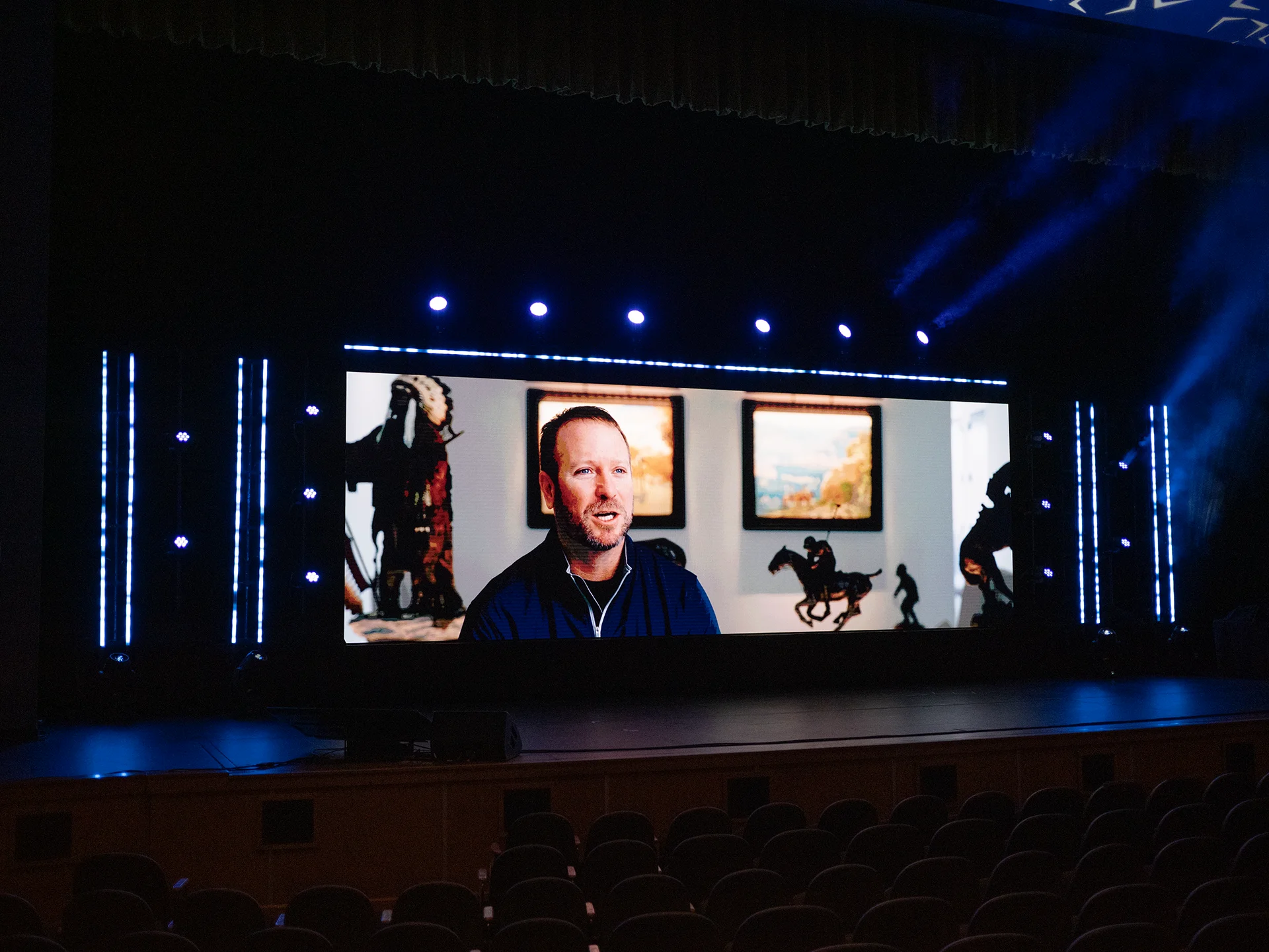 LED video wall displaying a prerecorded executive message during the Heritage Awards in Oklahoma City.