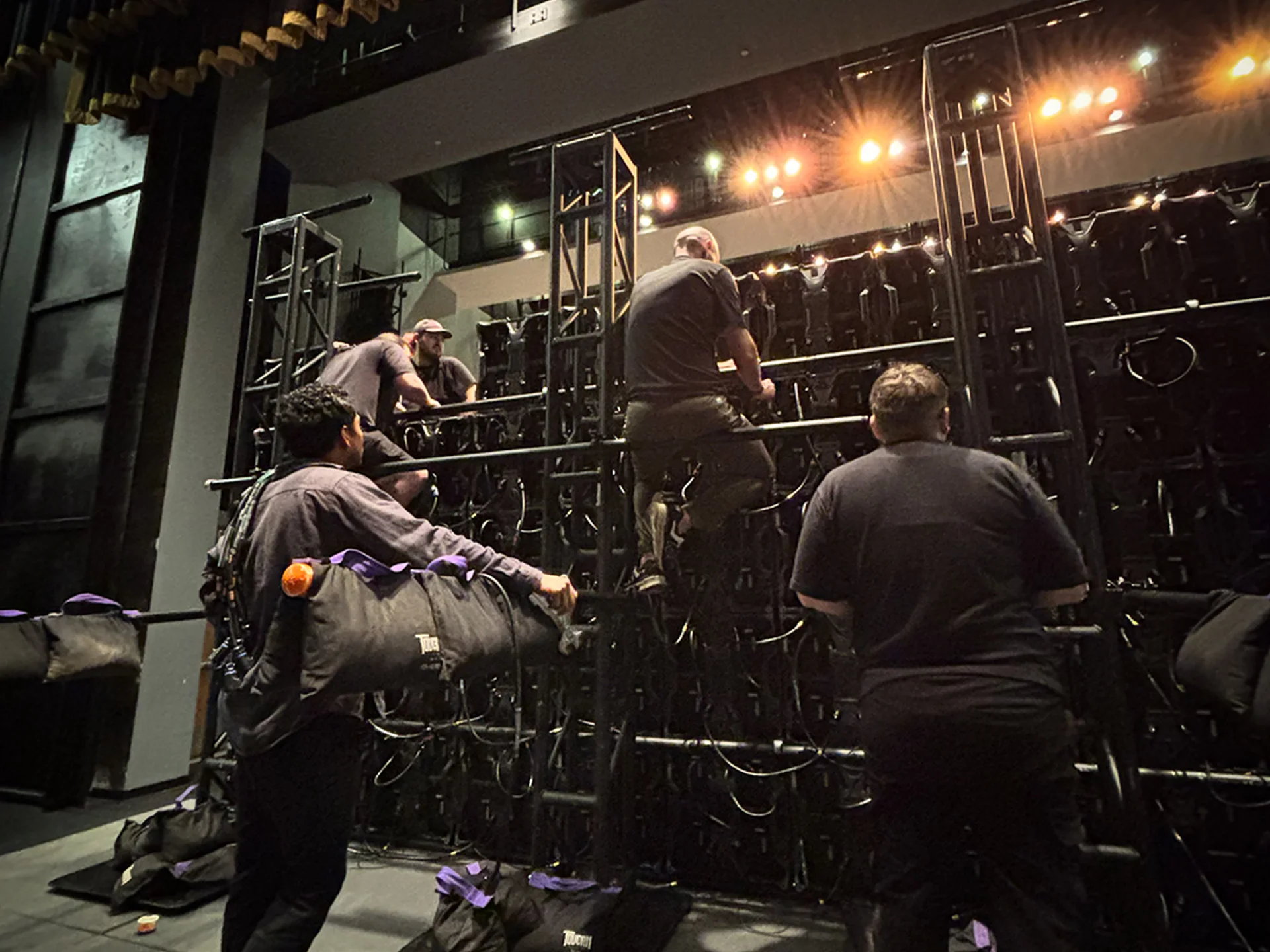 Crew installing a large LED video wall for Live Event Production Oklahoma City before the Heritage Awards.