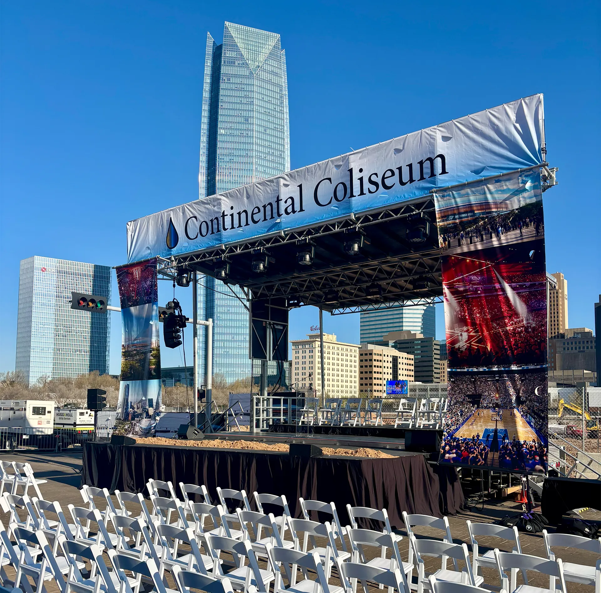 Custom event stage and truss structure with branded signage built by CNS Productions for Continental Coliseum groundbreaking in Oklahoma City